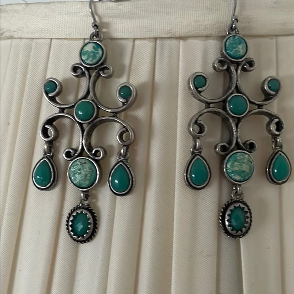 Silver and Green Dangle Earrings with Intricate Design